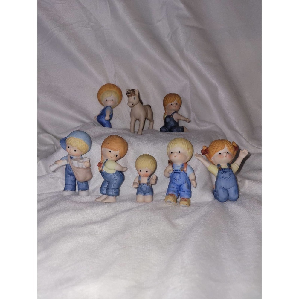 Vintage enesco country cousins figurines